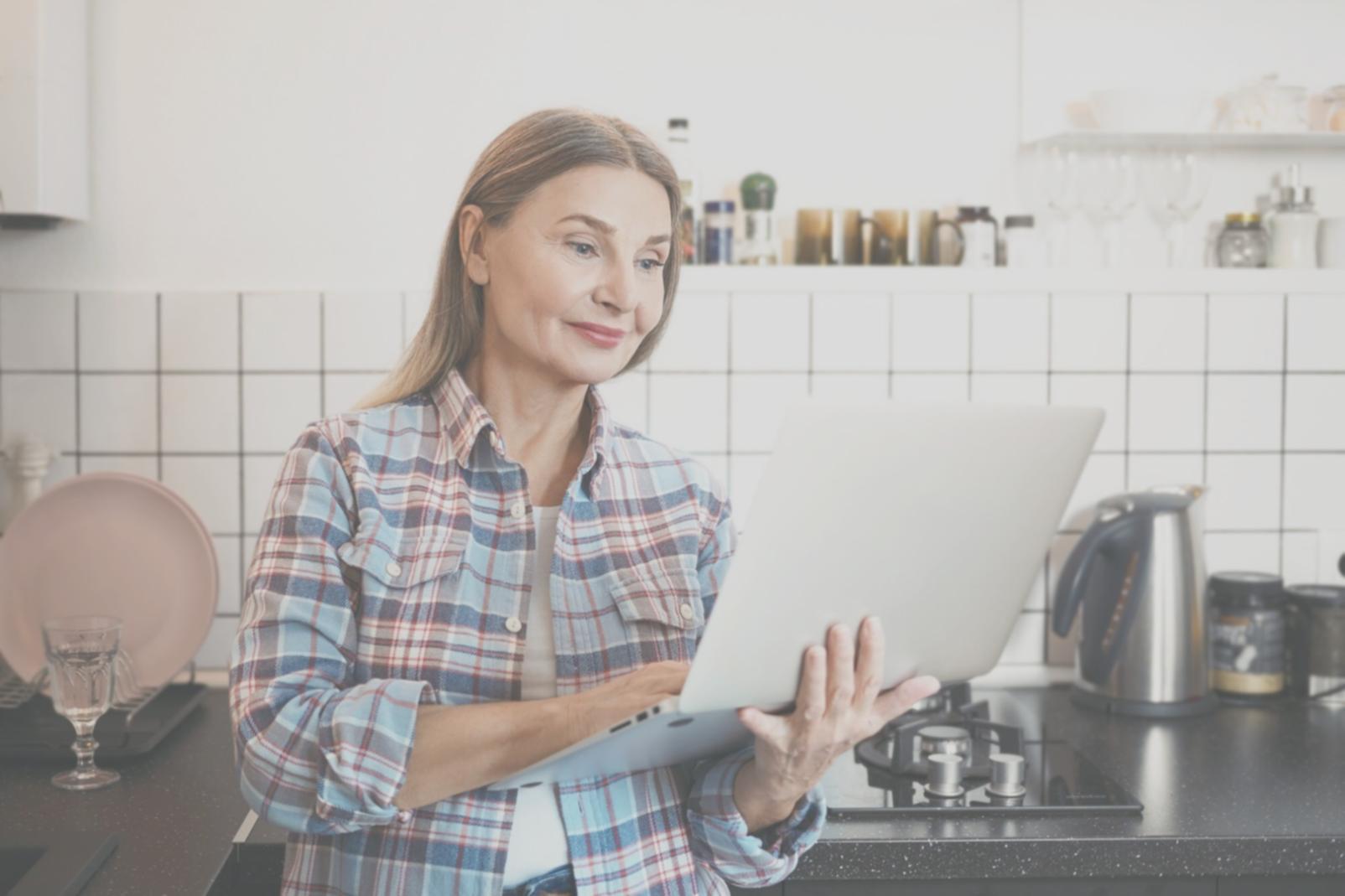 Modern workspace showing budget analysis software running on standard computer equipment